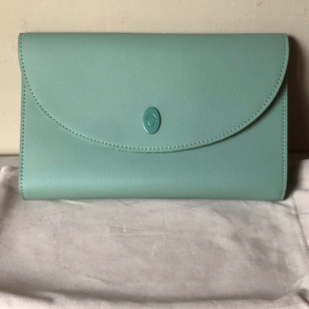 Aurate Women's green travel jewelry case with pouch.
